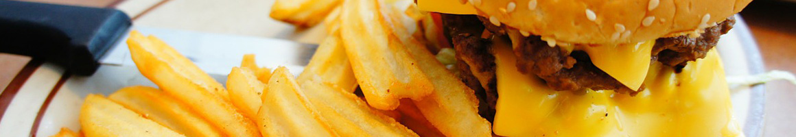 Eating Burger Chicken Wing at KKatie's Burger Bar Marshfield restaurant in Marshfield, MA.